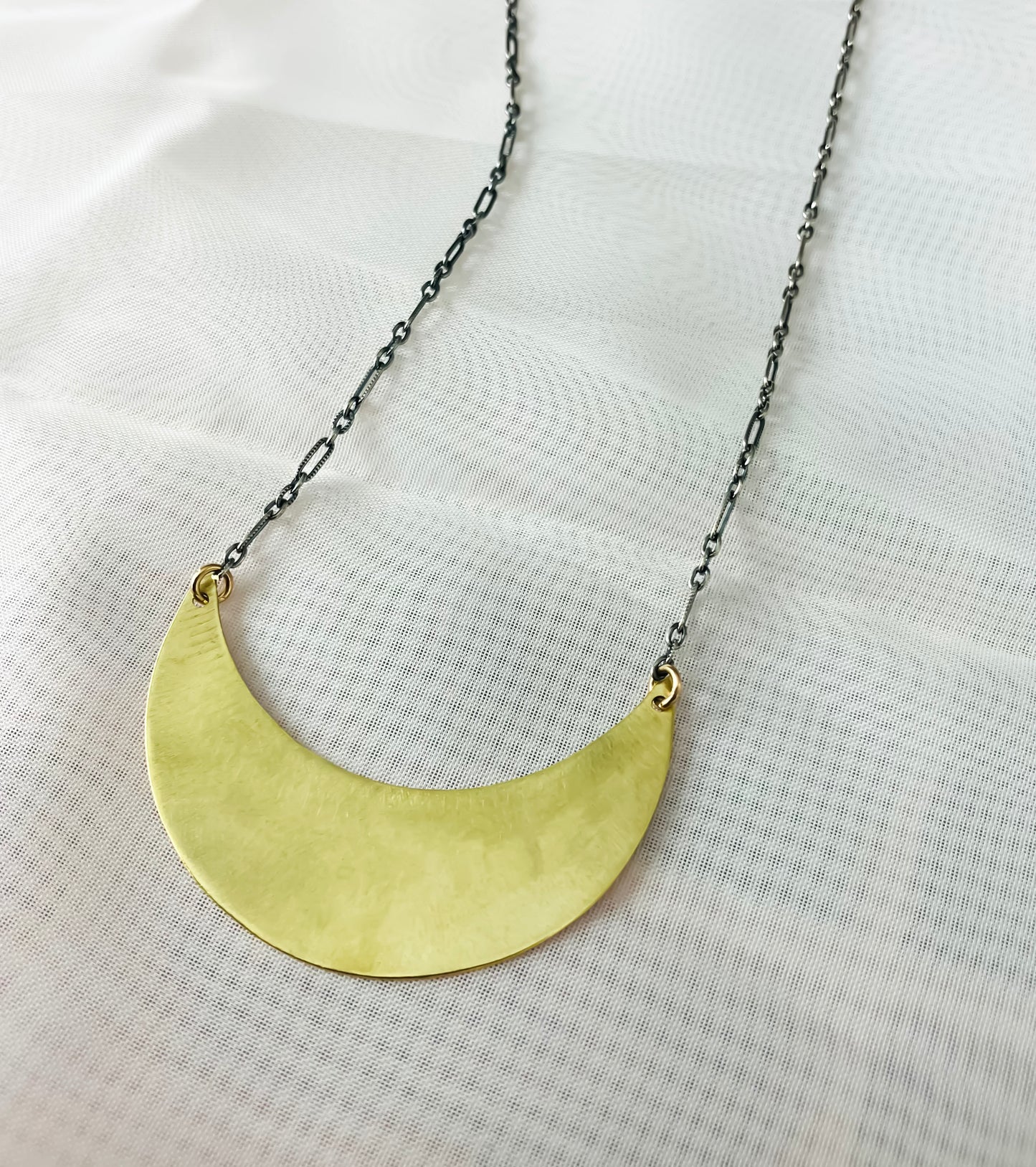 gold crescent moon necklace with black silver chain