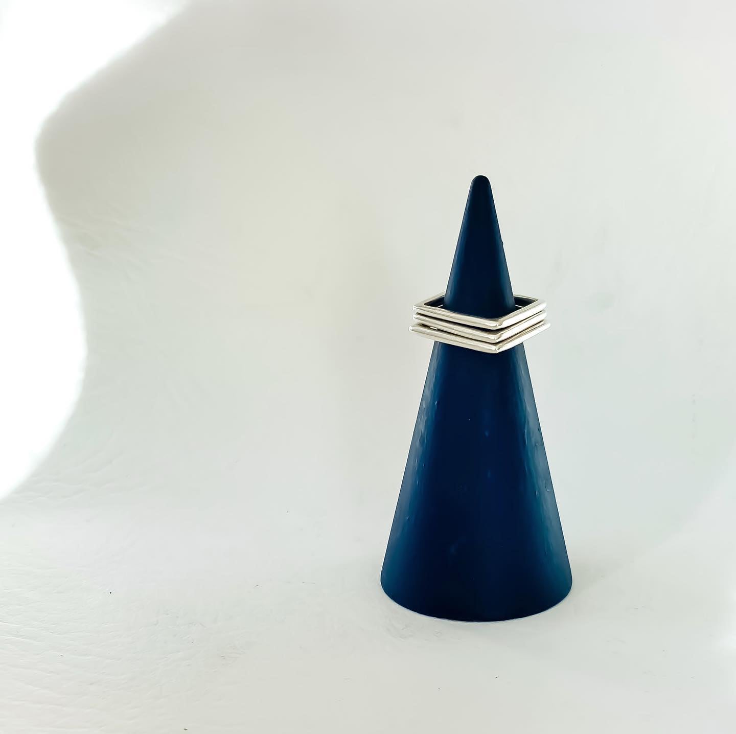 square sterling silver stacking ring against a white background